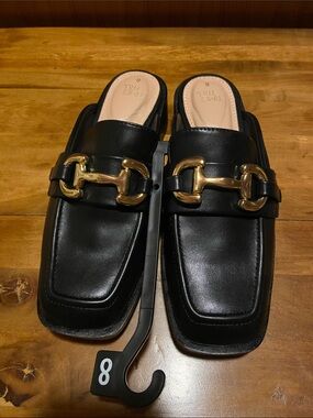 Time and Tru Black Slip-On Mules with Gold Bit Detail